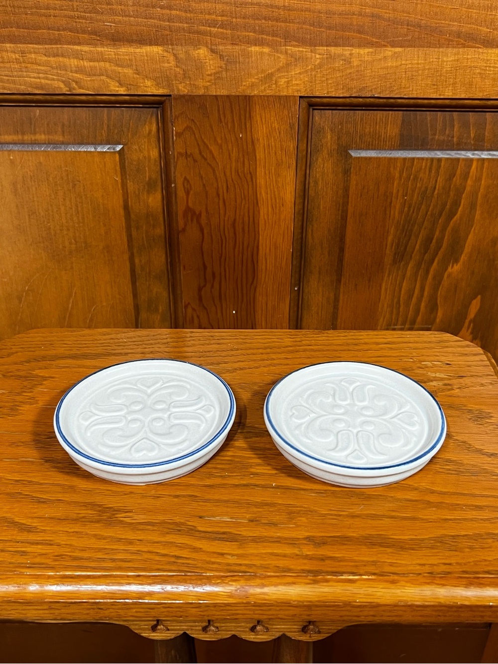 Vintage Pfaltzgraff Yorktowne 
Blue Rim Embossed 
Stoneware Coasters
Set of 2